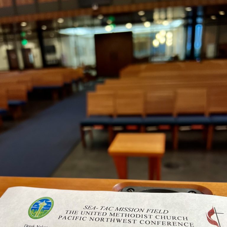 Church interior with wooden pews at the Sea-Tac Mission Field, The United Methodist Church Pacific Northwest Conference