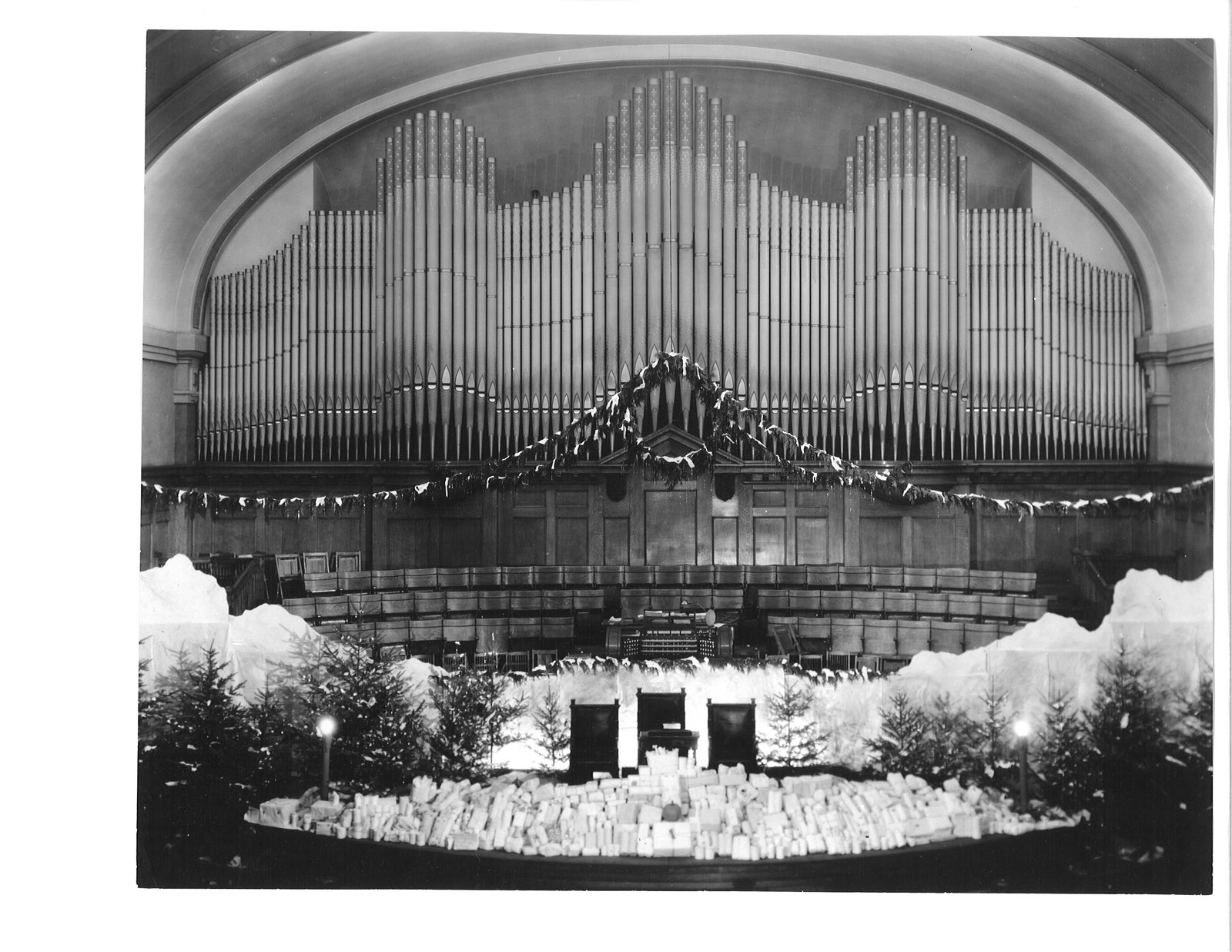 The Fifth and Marion altar decorated with White Christmas donations, circa 1932