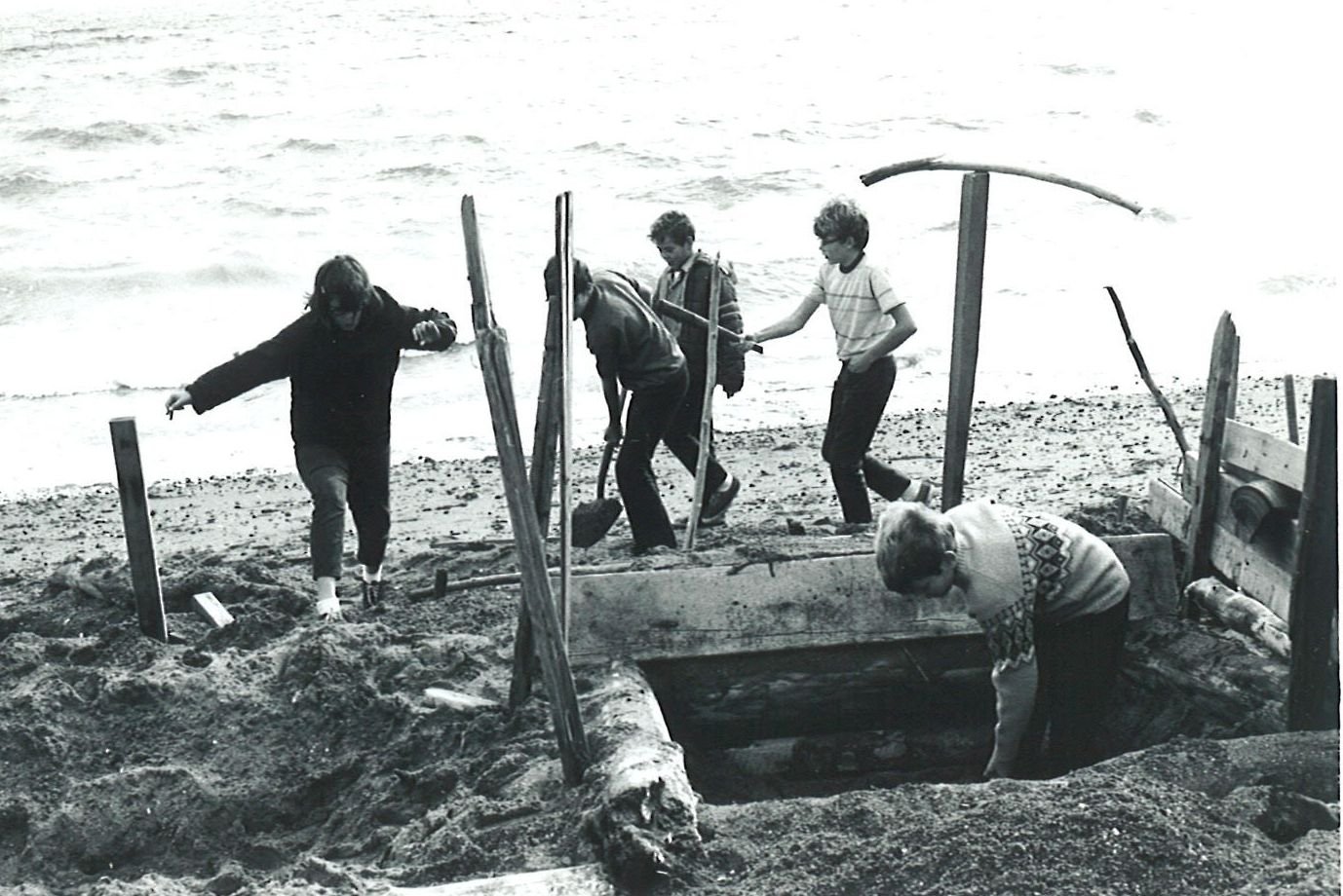 Children playing on the beach at Camp Indianola