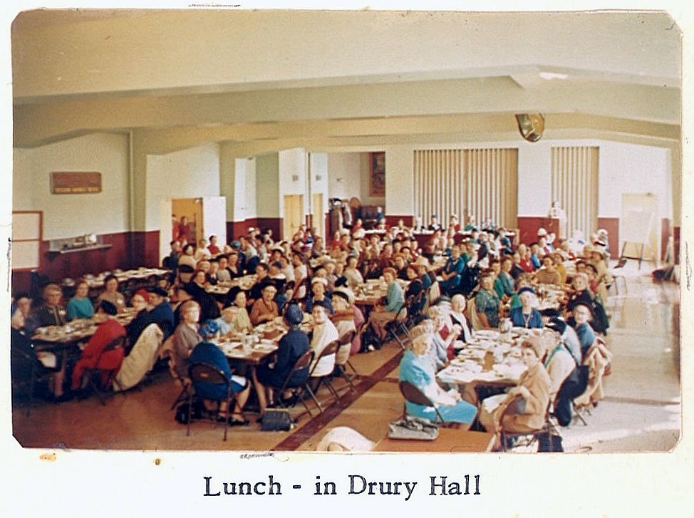 Women's luncheon gathering in Drury Hall around 1960