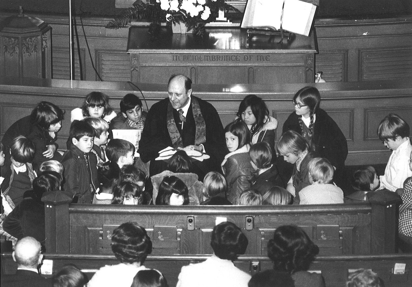 Rev. Dr. Robert Uphoff with children at First Church