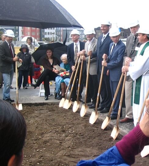 Church members turning soil at the 2008 groundbreaking for the new sanctuary
