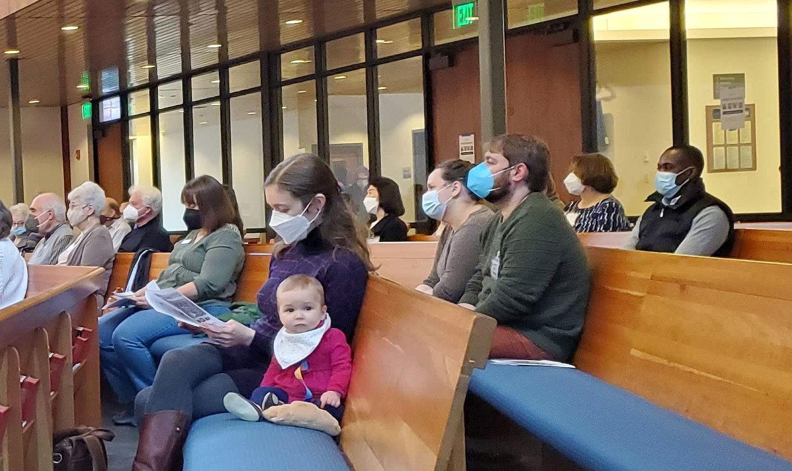 Congregation worshiping in masks in the sanctuary after in-person services resumed in 2021